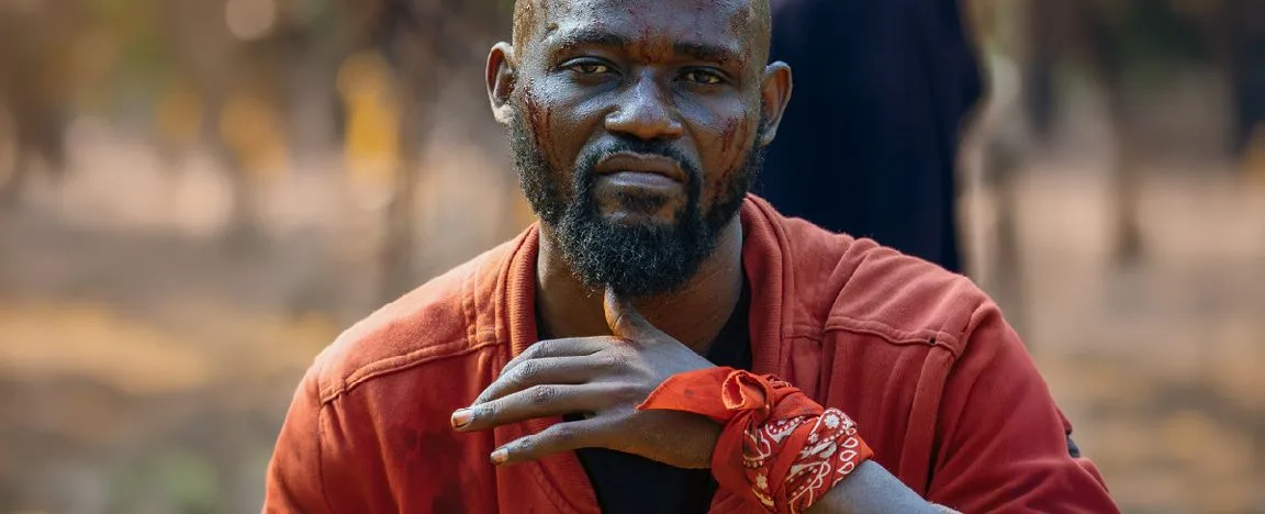 Isaei Karinda as Alex.